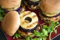 Teriyaki Turkey Burger with Grilled Pineapple and Red Onion Royalty Free Stock Photo