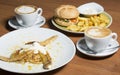 Hamburger meal and banana flambe dessert with coffee