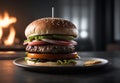 Hamburger on a plate on a dark background. Close-up. Royalty Free Stock Photo