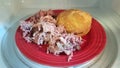 Hamburger with pork on red plate in microwave Royalty Free Stock Photo