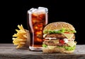 Hamburger, potato fries, cola drink. Royalty Free Stock Photo