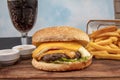 Hamburger, potato fries, cola drink. Takeaway food. Fast food Royalty Free Stock Photo