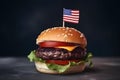 hamburger with small american flag on it, dark background, US patriotic proud theme, neural network generated image