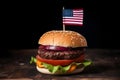 hamburger with small american flag on it, dark background, US patriotic proud theme, neural network generated image