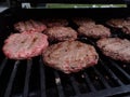 Hamburgers on the grill, Summertime barbecues, Royalty Free Stock Photo