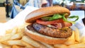 Hamburgers potatoes fried lettuce Royalty Free Stock Photo