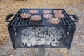 Hamburgers On A Public Charcoal Grill