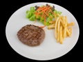 Hamburgers steak with french fries, bread and Vegetable isolated Royalty Free Stock Photo