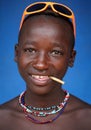 Hamer boy with sun glasses in South Omo, Ethiopia