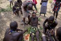 Omo Valley, Ethiopia - January 10, 2019: Hamer tribe members prepare for initiation rites