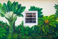 Hamilton, Bermuda - March, 20, 2016: street art of wall mural painting. Tropical garden painted on wall in street. Wall