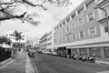 Hamilton, Bermuda - March, 20, 2016: street road. City street road. Cars and scooters parked along side of street road