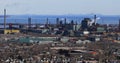 Hamilton industrial area with Toronto skyline in background Royalty Free Stock Photo