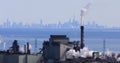 The Hamilton industrial area with Toronto skyline behind Royalty Free Stock Photo