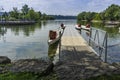 Lake and dragon boats seen from the pier at Bayfront Park in Hamilton, Ontario, Canada.