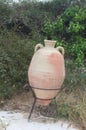 YASMIN-HAMMAMET, TUNISIA-MAY 02, 2019: antique clay jug on a stand