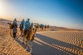 HAMMAMET, TUNISIA - Oct 2014: Camels caravan going in sahara desert on October 7, 2014