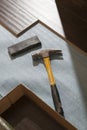 Hammer and Block with New Laminate Flooring