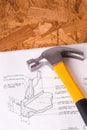 Hammer and Blueprints on Table Royalty Free Stock Photo
