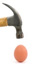 Hammer and egg Royalty Free Stock Photo