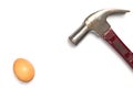 Hammer and egg isolated Royalty Free Stock Photo