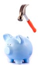 Hammer going to Smash Piggy Bank Royalty Free Stock Photo