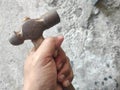 a hammer held by a person