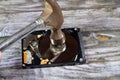 A Hammer on a laptop 2.5 inch hard disk drive storage memory, repair broken computer part, an open hard disc with platters, Royalty Free Stock Photo