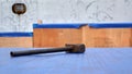 Hammer lying on top of box in ship cargo hold