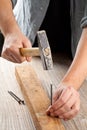 Hammer and nail woodworking Royalty Free Stock Photo