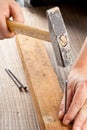Hammer and nail woodworking Royalty Free Stock Photo