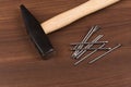 Hammer and nails on table Royalty Free Stock Photo