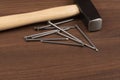 Hammer and nails on table Royalty Free Stock Photo