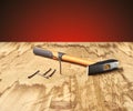 Hammer and nails on the wooden table Royalty Free Stock Photo