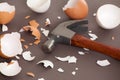 Hammer next to a bunch of cracked shells Royalty Free Stock Photo