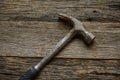 Hammer on rustic hardwood