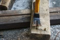 Hammer, rusty nail and wood for carpenter`s job