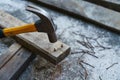 Hammer, rusty nail and wood for carpenter`s job