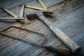 Hammer, Saw and Measuring Tape on Rustic Wood Royalty Free Stock Photo