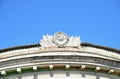 Hammer and Sickle in conjunction with the emblem of the USSR of the concrete on the roof of the old building . Royalty Free Stock Photo