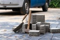 Hammer and trowel on the sidewalk with concrete bricks Royalty Free Stock Photo
