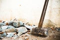 A hammer used to demolish the concrete tile floor and wall of the house before renovation. It heavy and very