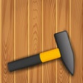 Hammer on wood background. Royalty Free Stock Photo