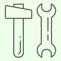 Hammer and wrench thin line icon. Two building tools spanner and knocker outline style pictogram on white background Royalty Free Stock Photo