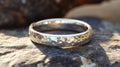 Hammered Silver Band Wedding Ring On Stone Royalty Free Stock Photo