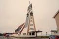 Hammerfest, Norway - January 21, 2010: church building on grey sky. Modern architecture and design. Religion and Royalty Free Stock Photo