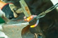 Hammering glowing steel - to strike while the iron is hot. Royalty Free Stock Photo