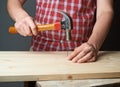 Hammering the nail composition Royalty Free Stock Photo