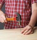 Hammering the nail composition Royalty Free Stock Photo