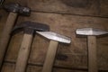 Hammers are on a wooden table. Royalty Free Stock Photo